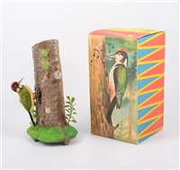 Lot 1218 - Max Carl wind-up toy woodpecker on tree truck...