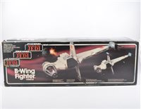 Lot 1254 - Star Wars B-Wing fighter vehicle; in tri-logo...