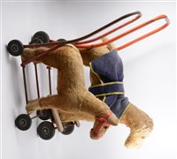 Lot 1385 - Tri-ang walk-a-long plush dog toy, along with...