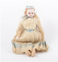 Lot 1391 - Victorian poured wax doll; with stuffed body,...