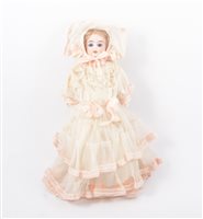 Lot 1392 - German bisque head doll; with hand woven...