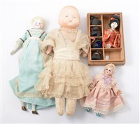 Lot 1396 - Small selection of bisque and china head dolls;...