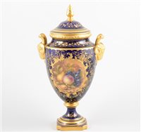 Lot 286 - Coalport vase and cover, painted with fruit,...