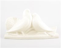 Lot 291 - A French pottery group of Doves, cream...