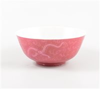 Lot 259 - A Chinese porcelain bowl, pink ground exterior...