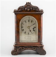 Lot 535 - Victorian mahogany table clock, scrolled top...