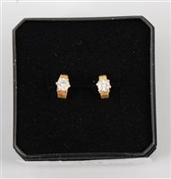 Lot 451 - A pair of diamond stud earrings, the brilliant...