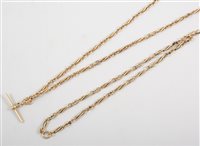 Lot 457 - A yellow metal chain in two parts, alternating...