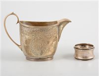 Lot 505 - An Edwardian silver cream jug, oval form with...