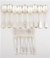 Lot 519 - Nine silver fiddle pattern dessert spoons,...