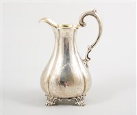 Lot 472 - A Victorian silver cream/milk jug, pear shaped...