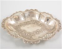 Lot 480 - A Victorian pierced oval silver dish, the base...