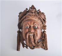 Lot 79 - Carved hardwood mask, probably Bali, the...