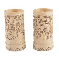 Lot 84 - A pair of Cantonese pierced and carved ivory...