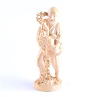 Lot 87 - A Japanese carved ivory okimono, a man and boy...