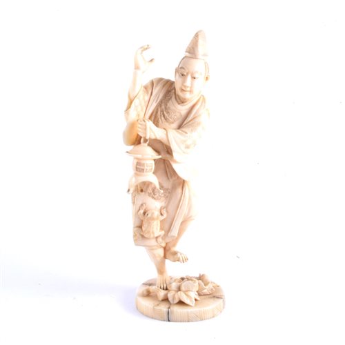 Lot 91 - A Japanese carved ivory okimono, a man holding...