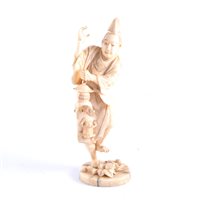 Lot 91 - A Japanese carved ivory okimono, a man holding...