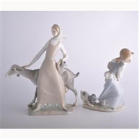 Lot 115 - Four Lladro figures, boy with fishing rod,...