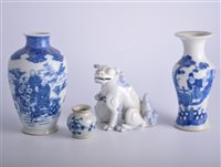 Lot 70 - Chinese blue and white model of a Temple lion...