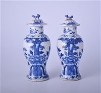 Lot 2 - Pair of Chinese blue and white covered vases,...