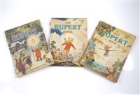 Lot 174 - Four soft cover Rupert Books, 1945,...