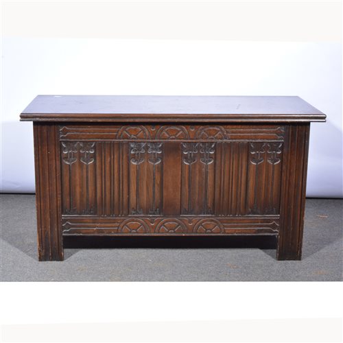 Lot 537 - Modern oak coffer, carved and fold panel front,...