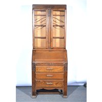 Lot 476 - 1940s oak bureau bookcase, the upper section...