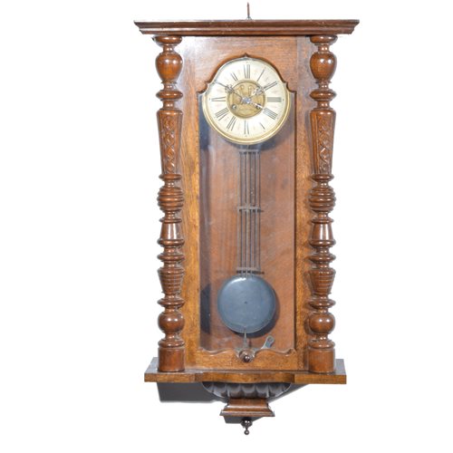 Lot 485 - An oak cased wall clock the roman numeral...