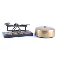 Lot 186 - A 14cm brass table bell with hammer, set of...