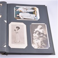 Lot 199 - Postcard album, containing approximately one...