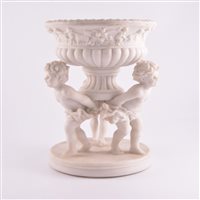 Lot 225 - A reproduction parian bowl supported by three...