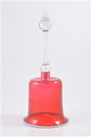 Lot 110 - A cranberry glass bell with vaseline glass rim...