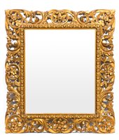 Lot 293 - Rectangular wall mirror, in a Florentine gilt...