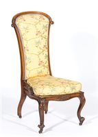 Lot 302 - Victorian walnut nursing chair, scrolled frame...