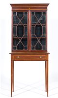 Lot 313 - Edwardian mahogany bookcase, simulated dentil...