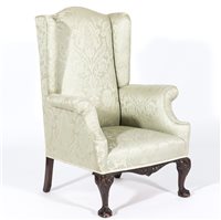 Lot 242 - George III style wing-back easy chair, 20th...