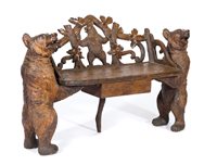 Lot 261 - Black Forest carved spruce/pine bench, shaped...