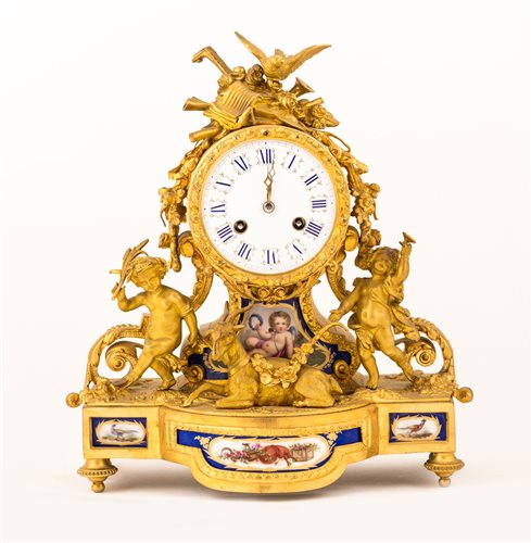 Lot 56 - Louis XV style gilt metal and Serves style...