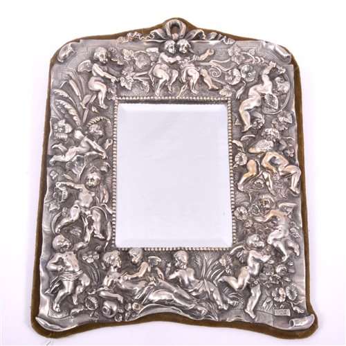 Lot 96 - A white metal faced mirror, the frame with...
