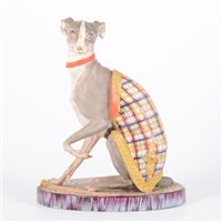 Lot 202 - A German porcelain model of a greyhound,...