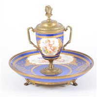 Lot 203 - Sevres style porcelain and gilt metal mounted...