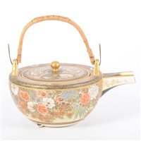 Lot 136 - A Satsuma tea pot of small size, black ground...