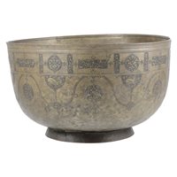 Lot 196 - An Islamic jardiniere, patinated metal, the...