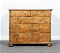 Lot 299 - George II walnut chest of drawers, basically...