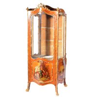 Lot 314 - Louis XV style tulip wood and gilt metal...