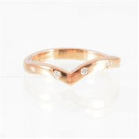 Lot 9 - Cathy Stephens - A diamond set wishbone ring,...