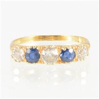Lot 35 - A sapphire and diamond half hoop ring, two...