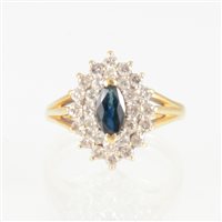 Lot 38 - A sapphire and diamond marquise shaped cluster...