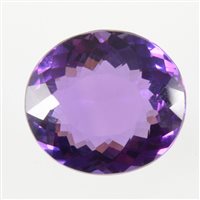 Lot 53 - A natural amethyst loose stone - Oval...