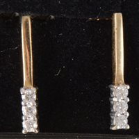 Lot 58 - A pair of diamond drop earrings, the 20mm long...